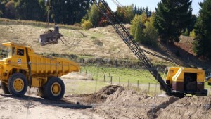 Ruston Bucyrus 30-RB Dragline loading a Caterpillar Truck