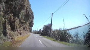 Driving Forks Okarito Road to the Okarito Lagoon and Wharf Building -   West Coast New Zealand | 4K