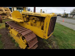 Old Caterpillar Diesel Crawler Tractor on display at the Fiordland Vintage Machinery Museum  | 4K