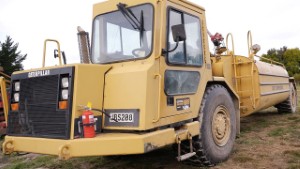 2006 Caterpillar 613C II with Water Tanker in Wanaka