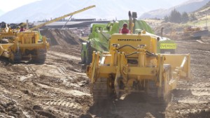 Classic Bulldozers and Earth Scraping Machines Working at Wheels at Wanaka