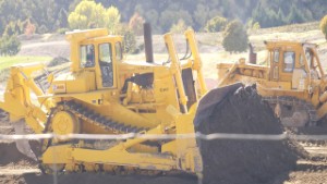 Vintage Bulldozers and Motor Scrapers Working in Wanaka