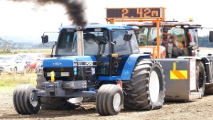 1994 Ford 8140 Tractor Pulling a 2023 JCB Fastrac 4220