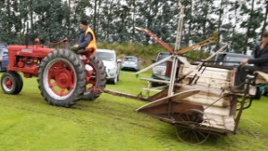 1941 McCormick Deering Farmall H Tractor Running a Binder